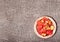 Fresh cloudberries prepared for food against the bag background