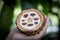 Fresh Cocoa fruit in a hand. Close up. Cut of raw cacao in Sri Lanka plantation