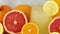 Fresh cold lemonade and sliced citrus fruits close up