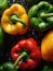 Fresh colorful peppers being rinsed and ready to be eaten