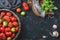 Fresh colorful ripe heirloom tomatoes in basket, copy space