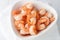 Fresh cooked shrimp in white bowl