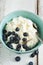 Fresh cottage cheese with sour cream, blueberries and honey