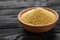 Fresh couscous on a wooden rustic background