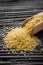 Fresh couscous on a wooden rustic background