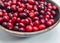 Fresh cranberries Fresh cranberries in wooden bowl