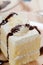 Fresh cream cake closeup with chocolate sauce