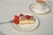 Fresh cream slice cake with strawberries and tea