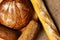 Fresh crispy rye bread and baguette. Country style. Assortment of bread, homemade bread. The counter in the bakery.