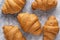 Fresh croissants.Delicious croissants for breakfast with coffee