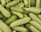 Fresh cropped green Zucchini; Offer in the vegetable market; Summer squash; It can be used as a food background