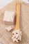 Fresh crumbled yeast on wooden spoon for baking or cooking