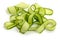 Fresh cucumber ribbon peels on white background