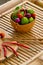 Fresh culinary ingredients for sauce guacamole on bamboo.