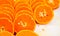 Fresh cut orange fruit background, many pieces of oranges, macro close up photo of healthy food, top view