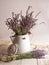 Fresh cut Phenomenal lavender with buds and flowers in water pitcher
