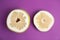 Fresh cut pomelo fruit on purple background, flat lay