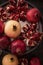 Fresh cuted pomegranates on the silver tray on dark rustic background flat lay 6