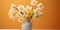 Fresh Daffodils in Vase Against Orange Backdrop