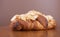 Fresh delicious Almond crescent on wood table