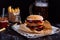 Fresh delicious burgers with french fries, sauce and beer on the wooden table