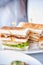 Fresh and delicious classic club sandwich on white dish