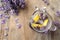 Fresh delicious lemonade with lavender in masson jar on table, top view