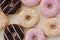 Fresh doughnuts with cream and chocolate macro