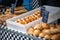 Fresh doughnuts and sourdough breads on display for sale