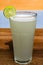 Fresh drink photo of home made limonade on wooden background