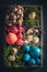 Fresh Easter eggs with feathers and hay in wooden box