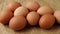 Fresh eggs on brown wrapping paper. Dietary products.