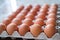 Fresh eggs for sale at a market. Fresh Chicken Rooster Eggs on at Local Farmer Market. close-up.