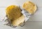 Fresh, empty wheat tortilla flat lay top view on dishcloth on white wooden table