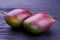 Fresh exotic mango on dark background.