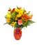 Fresh fall color flower arrangement in orange vase