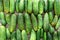 Fresh farm cucumbers on wooden background. Rustic style. Top view cucumber food background. Rustic style