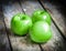 Fresh farm raised apples on rustic wooden background