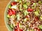 Fresh farro spelt salad with tomatoes, avocado