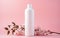 Fresh feminine beauty concept. White cosmetic bottle mock up on pink background with flowers. AI Generative