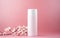 Fresh feminine beauty concept. White cosmetic bottle mock up on soft pink background with cherry flowers. AI Generative