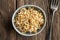 Fresh fenugreek sprouts in a bowl, top view