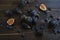 Fresh figs and blueberries on the wooden table