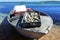 Fresh fish in ice inside a container on a small fishing boat