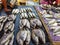 Fresh fish lies on a table at a fish market in Mbour, Senegal. It`s near Dakar, Africa. They are large and small fish of