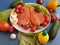 Fresh Fish  Raw Salmon Two steaks with ingredients vegetables and spices tomatoes lemon and olives cucumber green salat onion g