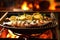 fresh fish sizzling on a boat grill with lemon slices