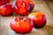 Fresh flat nectarines on a wooden background