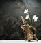 Fresh flowers in a wooden rustic snag