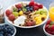 Fresh foods for a healthy breakfast - berries, fruits, nuts